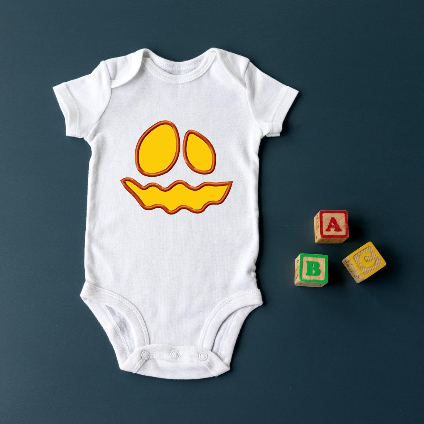 Pumpkin face - Applique design