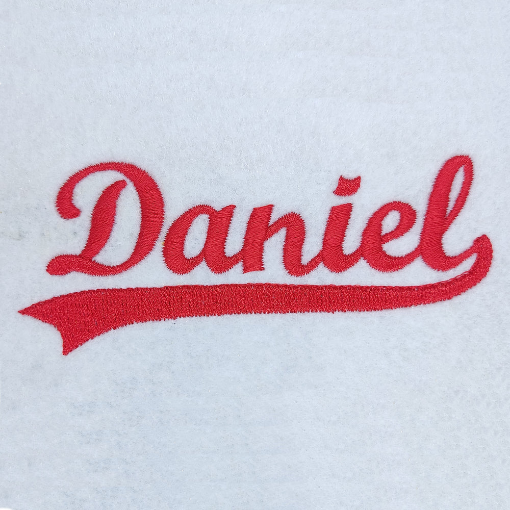 script embroidery font stitched as the name Daniel with an underline tail