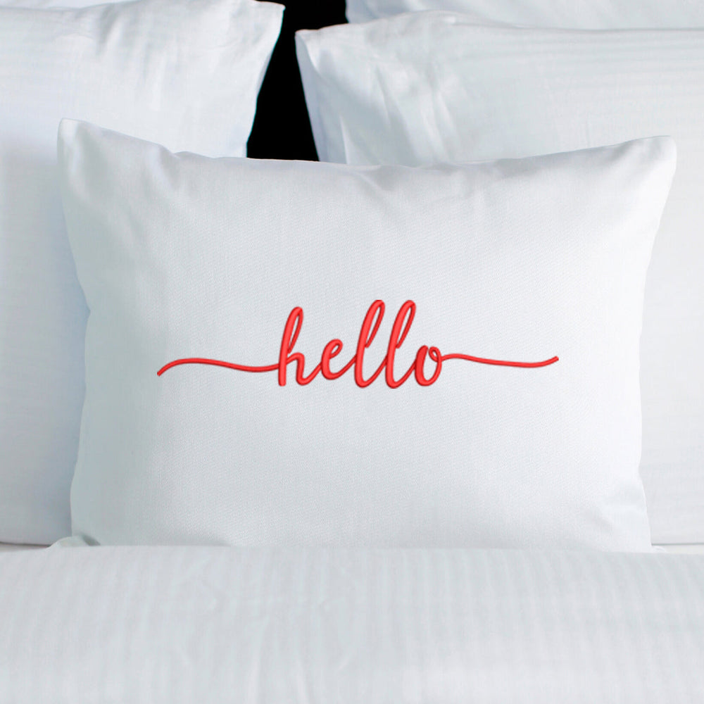 embroidery font with tails stitched as hello on a white pillow