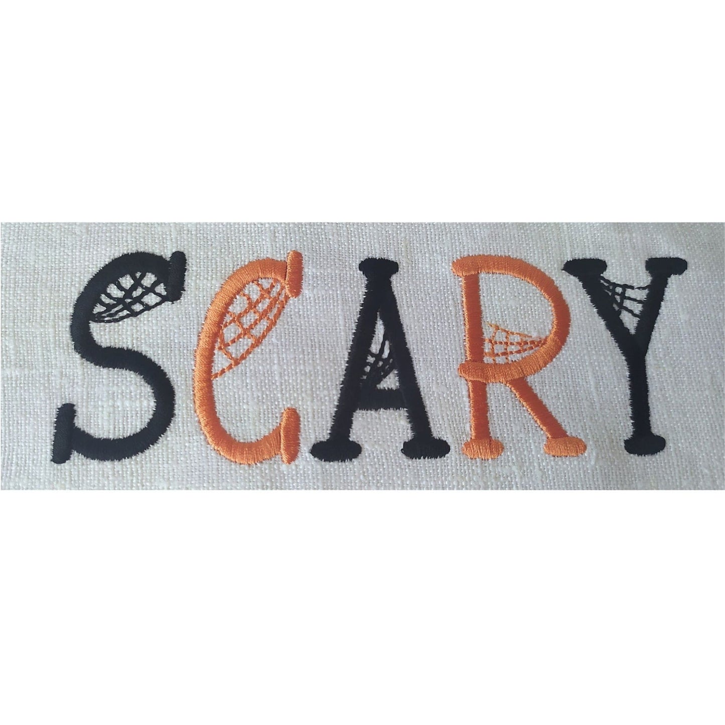 Embroidered word 'SCARY' with decorative letters on a white background