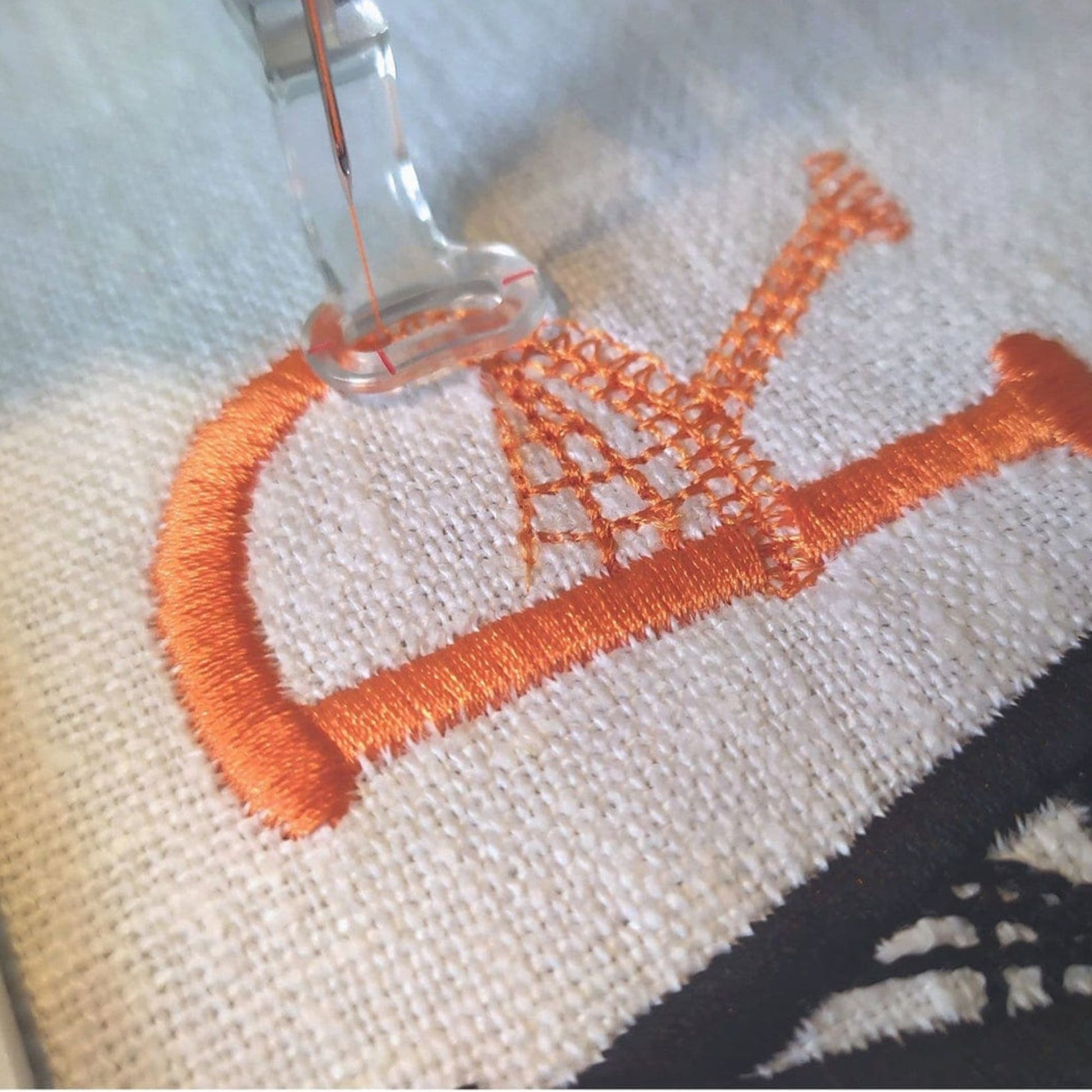 embroidery lettering on fabric in a hoop 